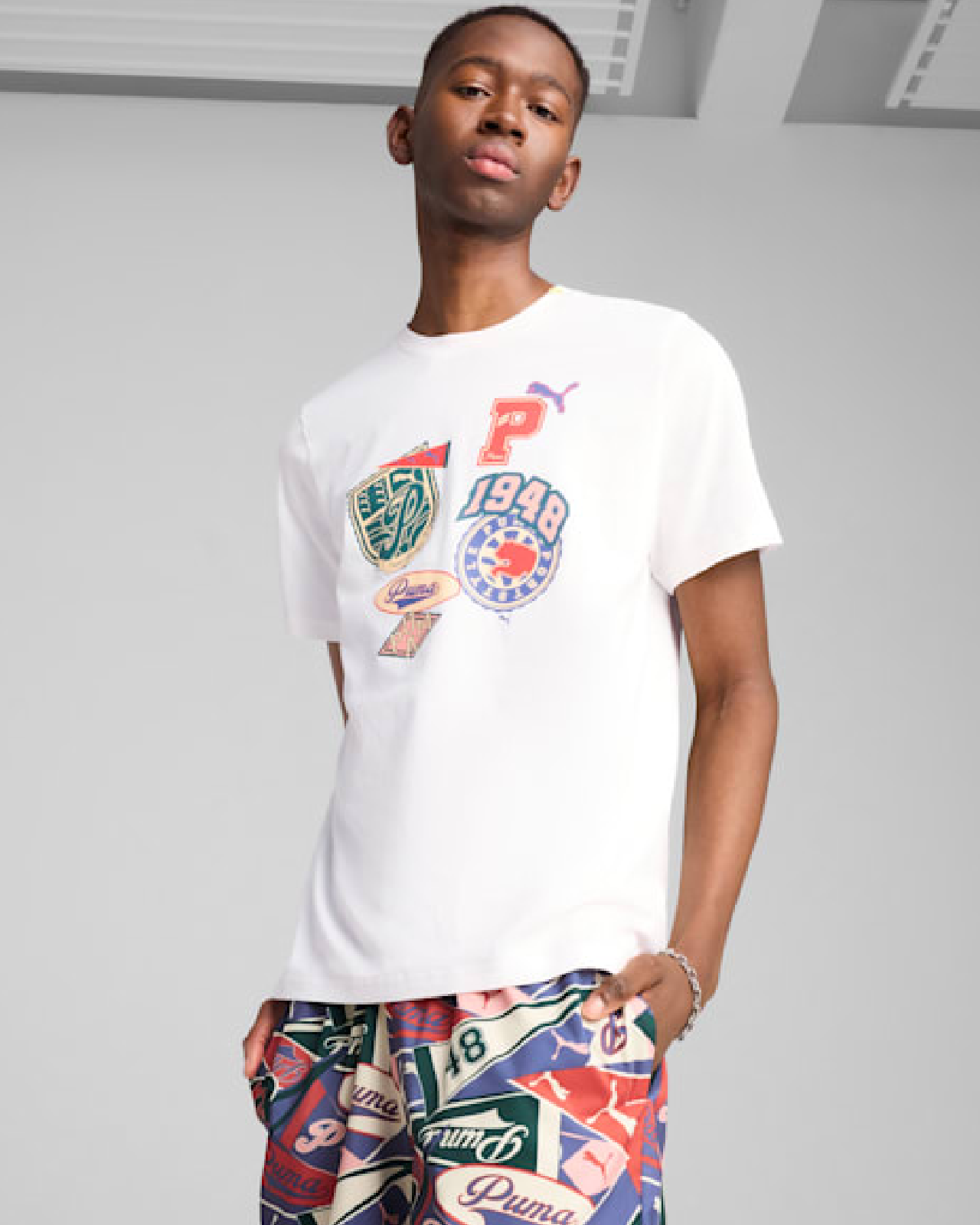 Image of Men's T-Shirt PUMA WARDROBE ESS SPORTS LEGACY Front Graphic Tee